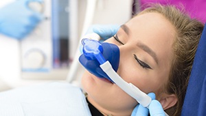 Relaxed woman with nitrous oxide nose mask