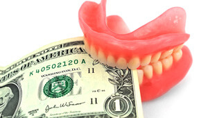 money in set of teeth